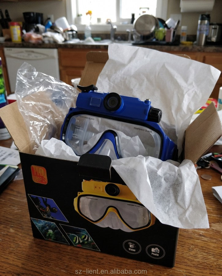 Blue mask in its box on a kitchen bench